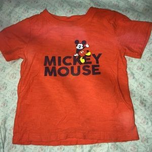 Orange Mickey Mouse shirt
